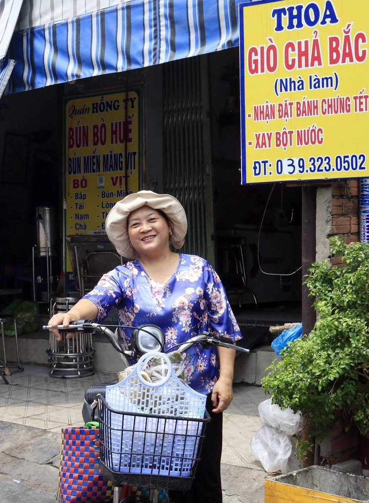 Sài Gòn - TP.HCM - miền đất hứa bao phận người - Kỳ 4: Từ gánh hàng rong đến cuộc sống đủ đầy - Ảnh 1. TP.HCM - Ảnh 1.