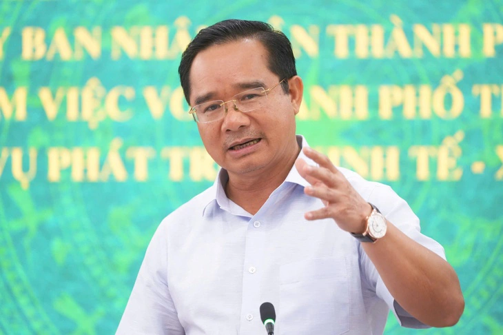 Chủ tịch UBND TP - Ảnh 1.