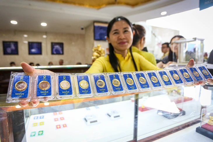 Giá vàng lao dốc khi Mỹ - Trung chuẩn bị đàm phán - Ảnh 1.