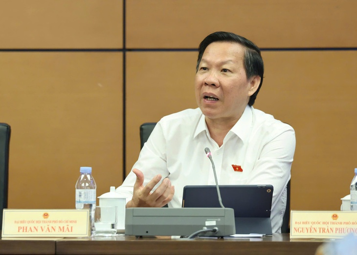 Đại biểu đề nghị làm rõ mô hình một trung tâm tài chính, hai điểm đến TP.HCM và Đà Nẵng - Ảnh 1.