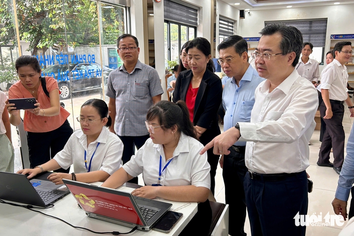Đồng loạt 102 phường, xã TP.HCM 'chạy thử' - Ảnh 5.