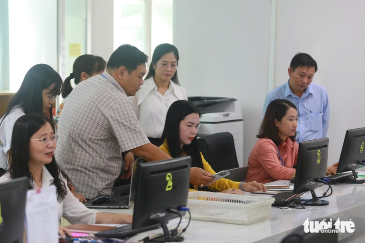 Đồng loạt 102 phường, xã TP.HCM 'chạy thử' - Ảnh 7.