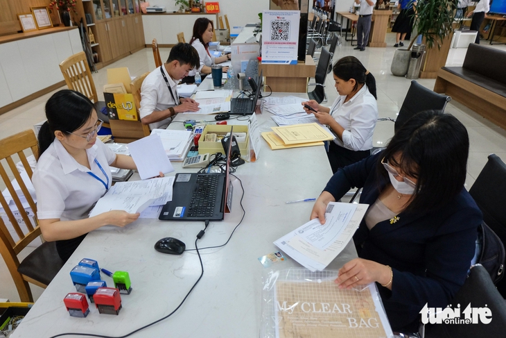 Sở Xây dựng TP.HCM kiến nghị tạm giao cho cấp xã cấp phép xây nhà ở - Ảnh 1.