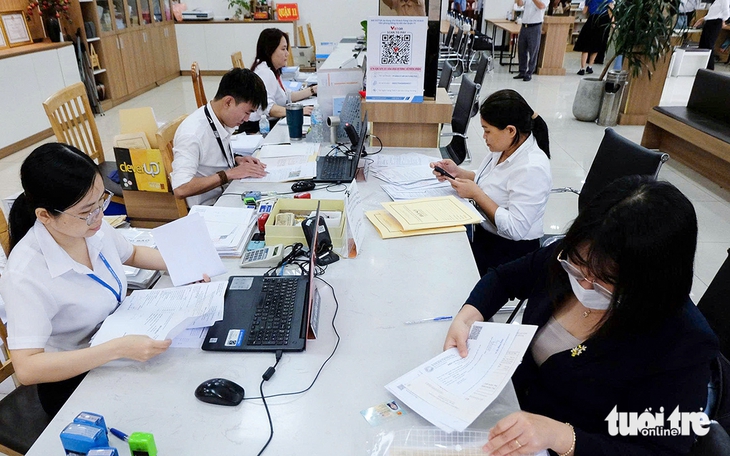 TP.HCM yêu cầu không để người dân đợi quá 20 phút khi nộp hồ sơ tại phường, xã mới - Ảnh 1. phường, xã mới - Ảnh 1.
