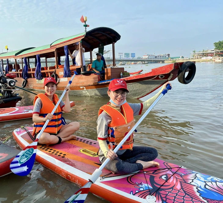 Cần Thơ khởi tranh Giải đua thuyền ván sup mở rộng - Ảnh 3.