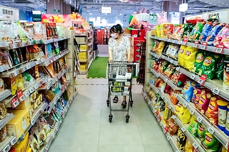 Trung Quốc: Doanh số bán lẻ bất ngờ khởi sắc - Ảnh 1. Trung Quốc - Ảnh 1.