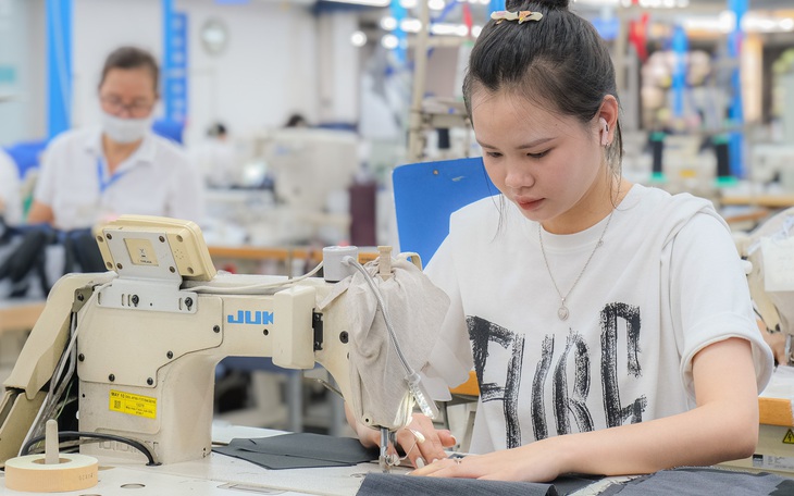 Tăng 7,2% lương tối thiểu vùng: Tạo động lực cho người lao động - Ảnh 2.