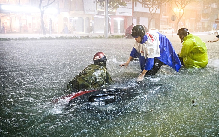 Áp thấp nhiệt đới ngoài khơi Philippines khả năng mạnh lên thành bão trong 24 giờ tới - Ảnh 2.