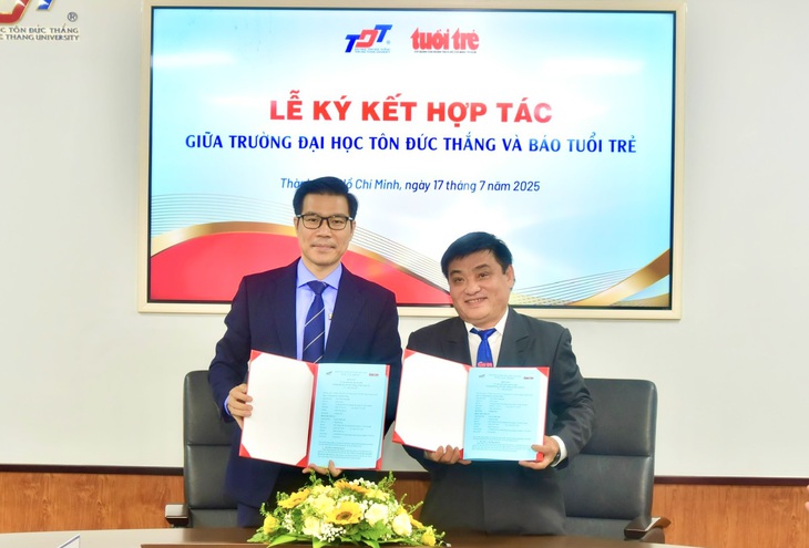 Báo Tuổi Trẻ và Trường đại học Tôn Đức Thắng hợp tác đào tạo nhân lực truyền thông - Ảnh 1.