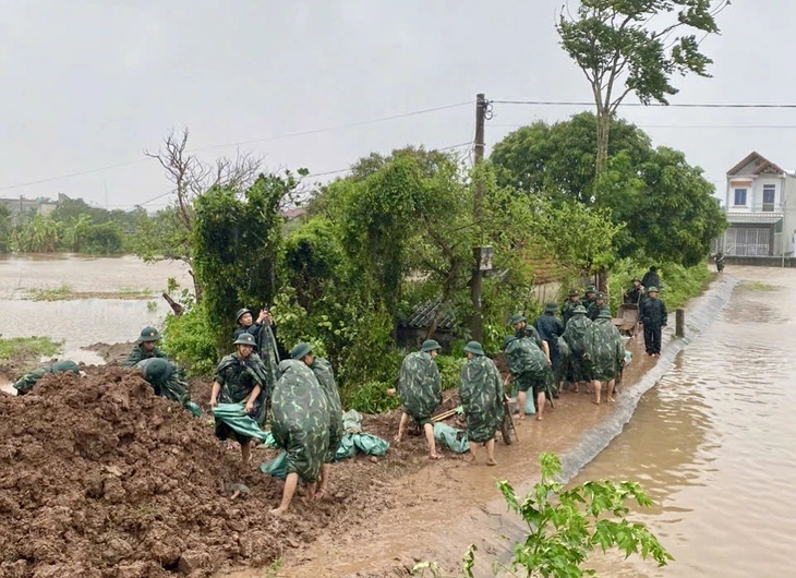 Bộ Quốc phòng thông tin sự cố vỡ đê tại Hưng Yên do bão số 3 - Ảnh 1.