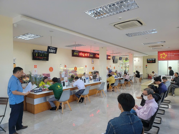Khẩn trương đưa Trung tâm hành chính công TP.HCM và 38 chi nhánh hoạt động từ 31-7 - Ảnh 1.