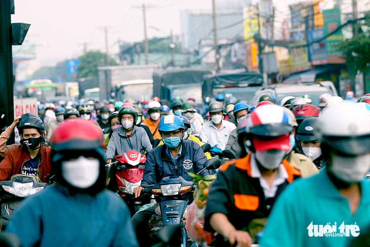 Dự án mở quốc lộ 1, 13, 22 và cầu đường Bình Tiên đang tới đâu? - Ảnh 1.