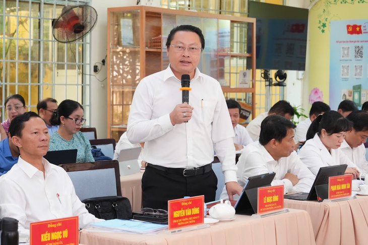 Trưởng Ban Nội chính Thành ủy TP.HCM làm việc với các phường về tổ chức Đại hội - Ảnh 4.