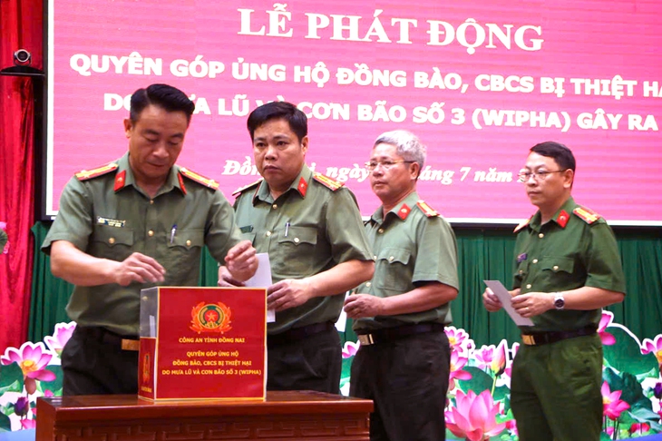 Công an Đồng Nai phát động quyên góp ủng hộ đồng bào thiệt hại do mưa lũ và bão số 3 - Ảnh 1.