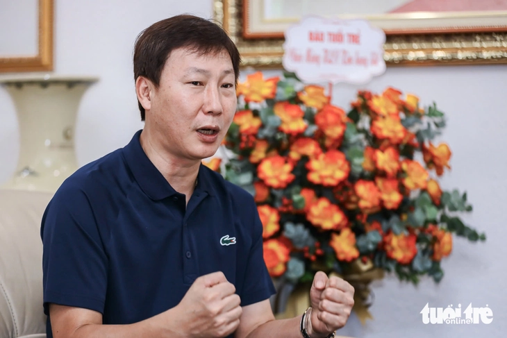Kim Sang Sik - Ảnh 2.