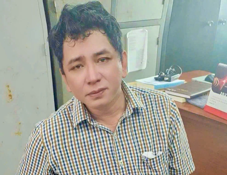 Nguyên giám đốc công ty đo đạc đầu thú sau hơn 2 tháng trốn truy nã- Ảnh 1.