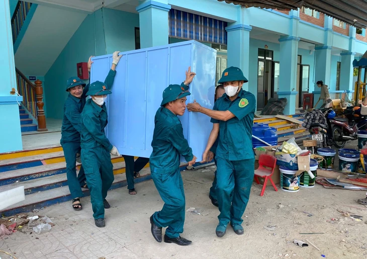 Nhiều trường học tại Nghệ An hoãn tựu trường vì bão số 5 - Ảnh 1.