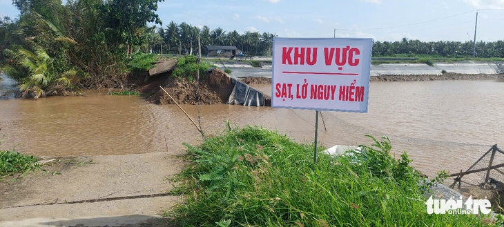 Công bố tình huống khẩn cấp sạt lở tuyến đê bao Bắc rạch Trà Cú - Ảnh 1.