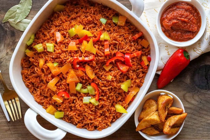 Nấu nồi cơm jollof siêu to để lập kỷ lục Guinness thế giới - Ảnh 7.