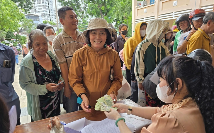 Người dân nhận quà 100.000 đồng 2 lần có phải trả lại? - Ảnh 2.