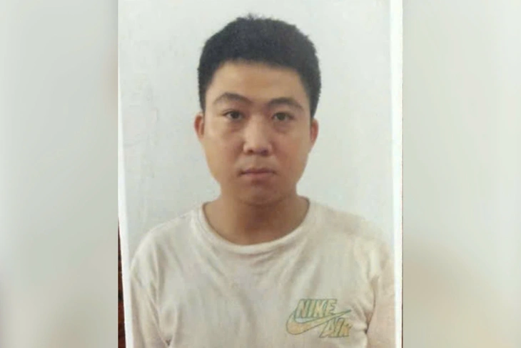 Công an TP.HCM truy nã Dương Huệ Tính do mua bán vũ khí quân dụng - Ảnh 1.