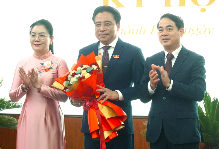 Bà Phạm Thị Xuân Trang điều hành hoạt động của HĐND tỉnh Khánh Hòa - Ảnh 1.