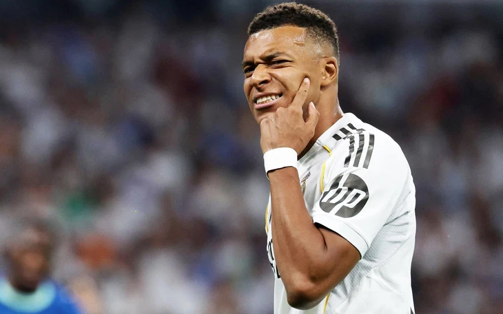Tranh cãi về luật bóng chạm tay trong vòng cấm giúp Real Madrid giành chiến thắng - Ảnh 2.