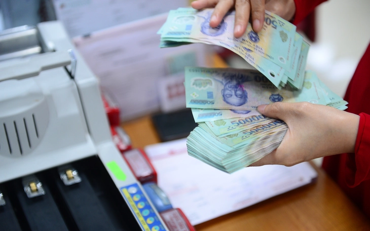 Từ 1-11 chuyển tiền từ 500 triệu đồng phải khai báo - Ảnh 2.