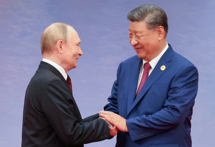 Ông Putin hội đàm với ông Tập ở Bắc Kinh, nói về mối quan hệ ở 'mức chưa từng có' - Ảnh 1.