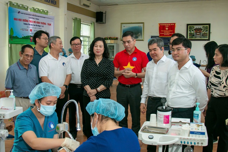 Ký kết chương trình chăm sóc sức khỏe răng miệng trẻ em, người cao tuổi ở Côn Đảo - Ảnh 2.