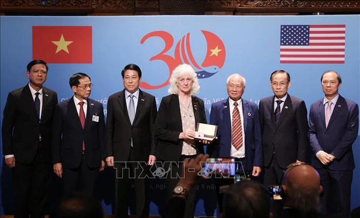 Chủ tịch nước: Câu chuyện hàn gắn quan hệ Việt - Mỹ là bằng chứng cho sức mạnh của lòng bao dung - Ảnh 2.