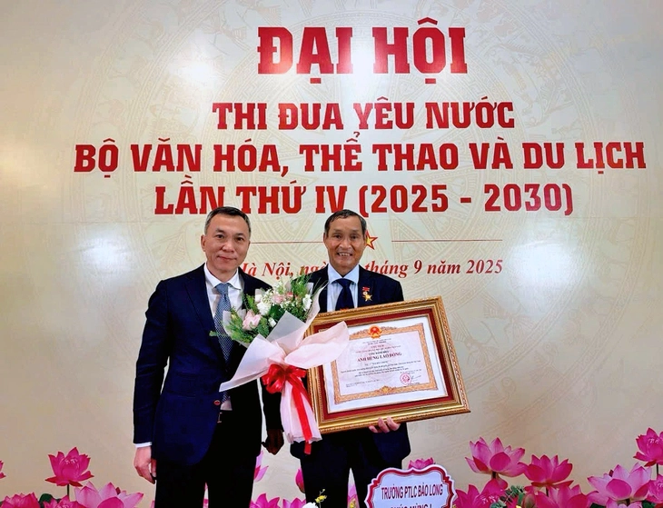 Trao tặng danh hiệu Anh hùng Lao động cho huấn luyện viên Mai Đức Chung - Ảnh 2.
