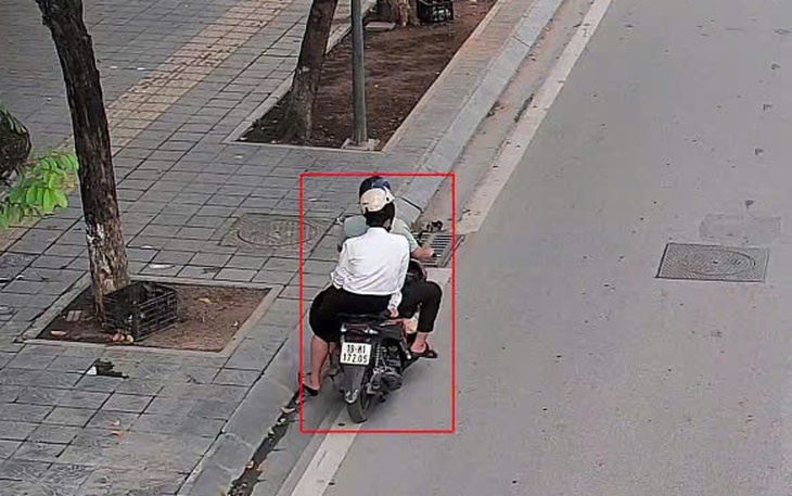 Một góc phố, camera AI phát hiện hàng trăm tài xế xe máy không đội mũ bảo hiểm - Ảnh 2.
