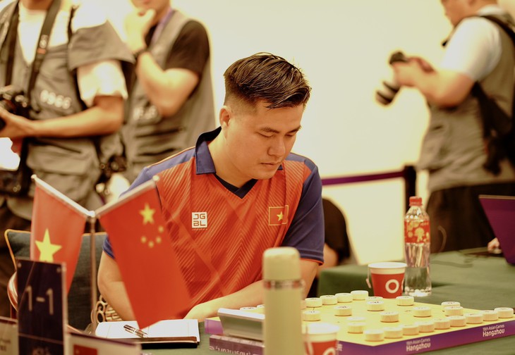 Nhìn lại hành trình vô địch cờ tướng thế giới của kỳ thủ Lại Lý Huynh - Ảnh 1.