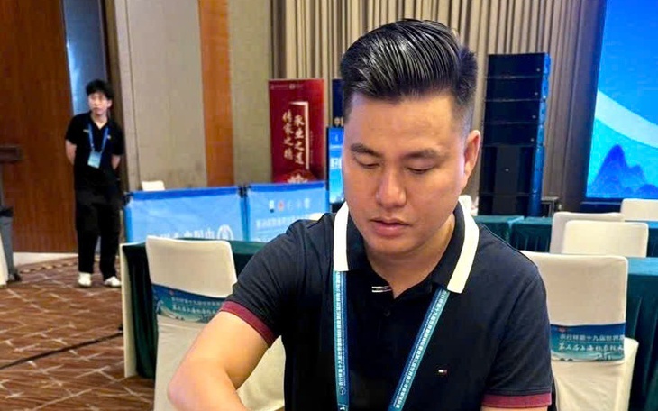 Nhìn lại hành trình vô địch cờ tướng thế giới của kỳ thủ Lại Lý Huynh - Ảnh 2.