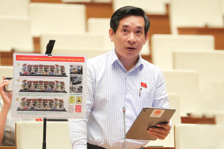 Đại biểu Nguyễn Văn Cảnh hiến kế cách đỗ ô tô trước cửa nhà dân tránh mâu thuẫn, bị phá hỏng xe - Ảnh 1.