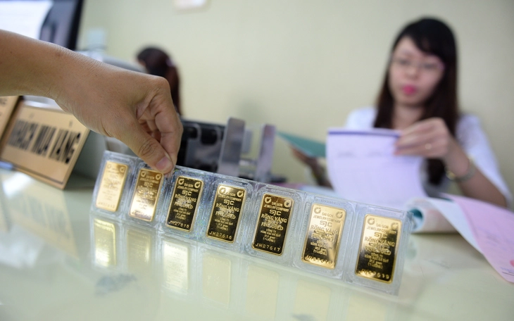 Giá vàng thế giới bất ngờ giảm 425 USD/ounce  - Ảnh 3.