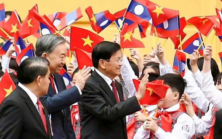 Đại tướng Phan Văn Giang tiếp Bộ trưởng Bộ Quốc phòng Lào - Ảnh 3.