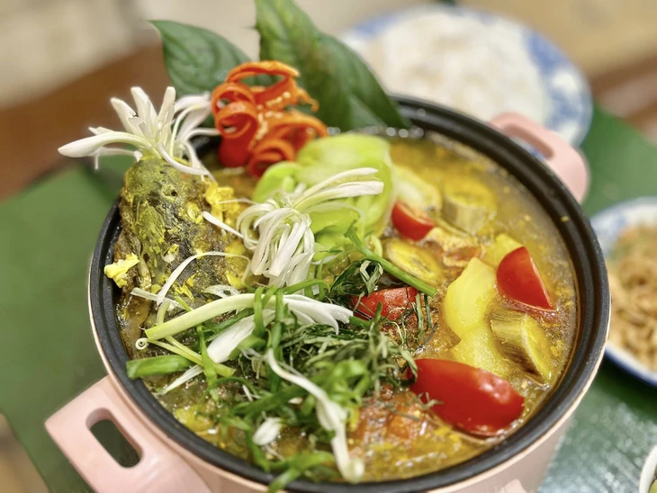 Cá chép bung - Ảnh 1.