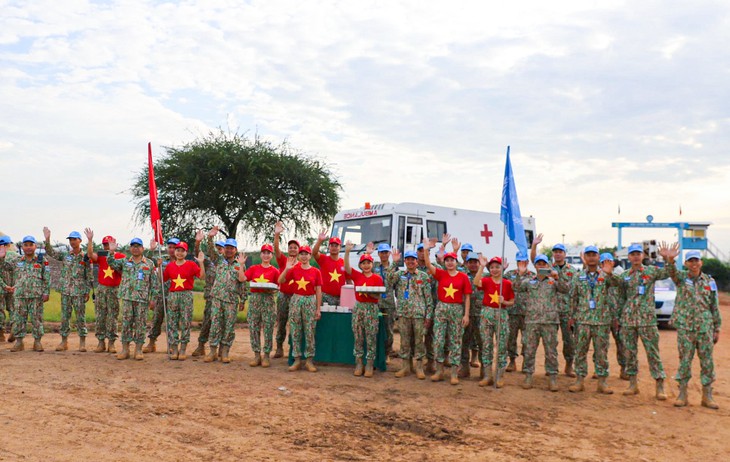 Đội công binh số 5 Việt Nam tham gia hoạt động đi bộ quốc tế vì hòa bình tại Abyei - Ảnh 2.