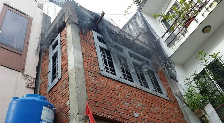 Xây nhà đừng phiền hà hàng xóm - Ảnh 1.