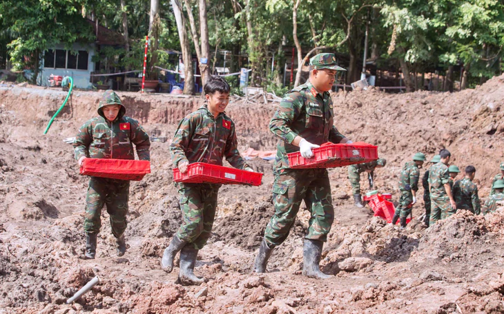 Khảo sát nơi nghi có hài cốt 16 liệt sĩ hy sinh ở Quảng Trị - Ảnh 2.