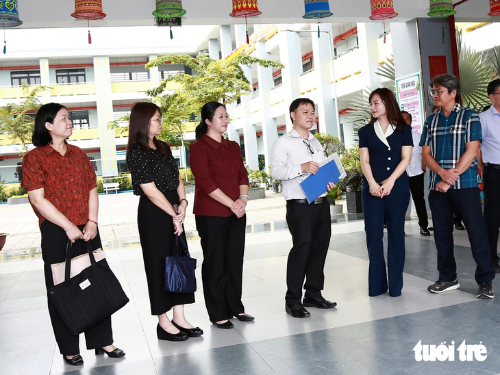 Đoàn công tác liên ngành của Bộ Nội vụ khảo sát các xã dự kiến lên phường ở TP.HCM - Ảnh 2.