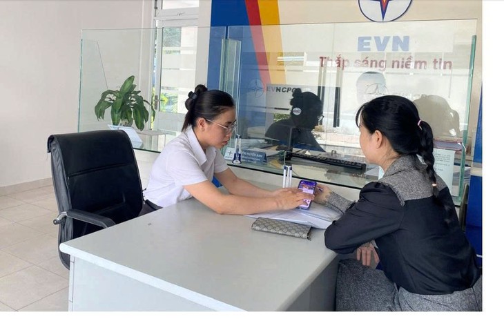 Công ty Điện lực Đà Nẵng đẩy mạnh tuyên truyền App EVN CSKH và tổng đài 1558 - Ảnh 1.