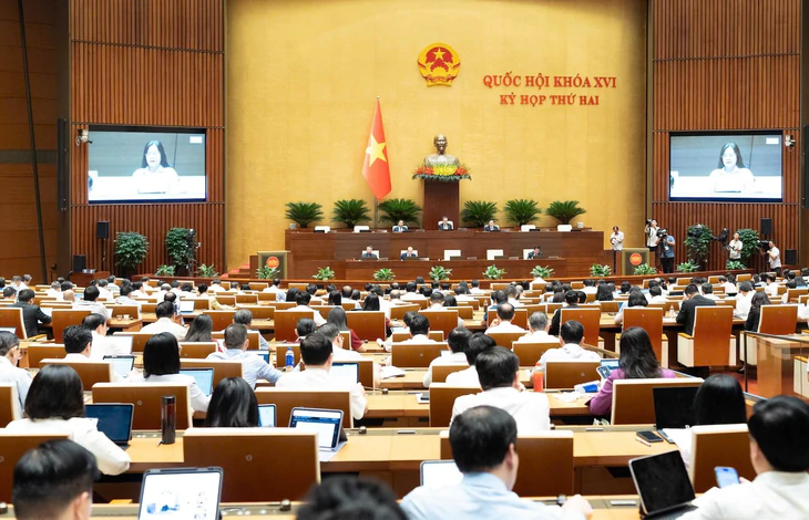 Bộ trưởng Bộ Xây dựng nói về xử lý vi phạm các dự án của ông Lê Thanh Thản - Ảnh 1.