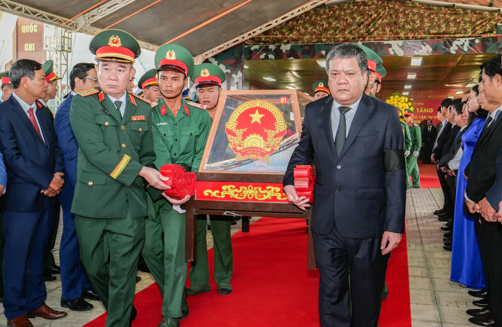 Truy điệu, an táng 25 hài cốt liệt sĩ tại nghĩa trang liệt sĩ Ninh Thuận - Ảnh 2.