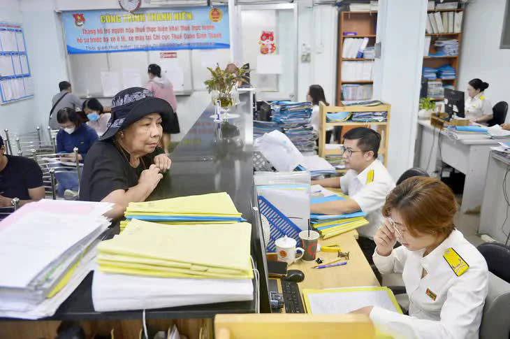 Thuế TP.HCM: Không để người dân mất thời gian giải quyết tiền nợ thuế ảo  - Ảnh 1.