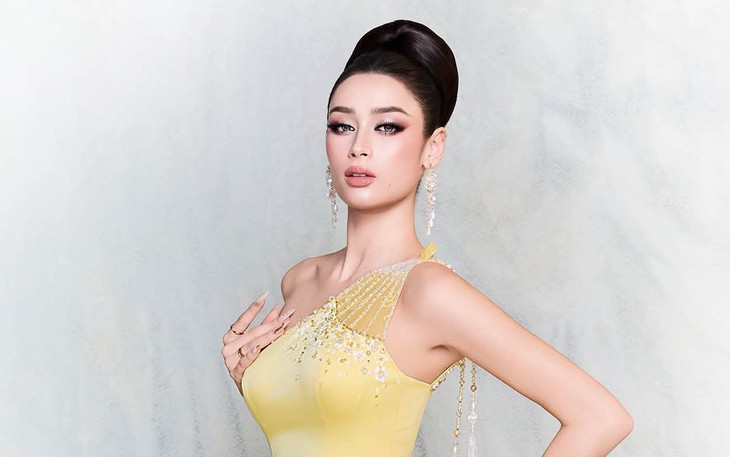 Emoura Phạm đổi đầm dạ hội, mang ‘Phượng hoàng lửa’ lên sân khấu Miss Grand International 2026 - Ảnh 9.
