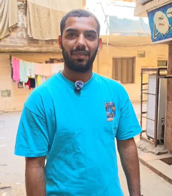 Khoảnh khắc thanh niên Ai Cập đỡ bé trai 5 tuổi rơi từ ban công viral - Ảnh 1.