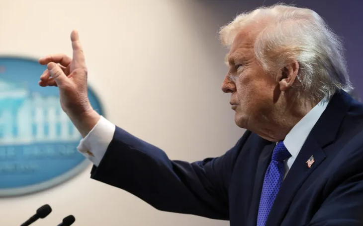 Trung Quốc nói sẽ kiên quyết đáp trả thuế của ông Trump - Ảnh 3.